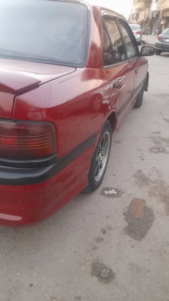 مازدا 323 1993 - صورة 4