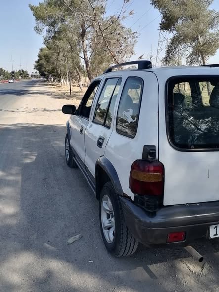 كيا سبورتاج 2001 - صورة 4
