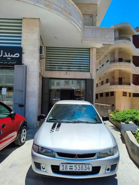 ميتسوبيشي لانسر 1998 - صورة 4