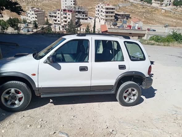 كيا سبورتاج 2001 - صورة 2