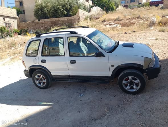 كيا سبورتاج 2001 - صورة 3
