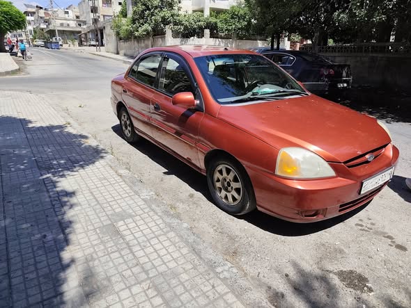 كيا ريو 2002 - صورة 4