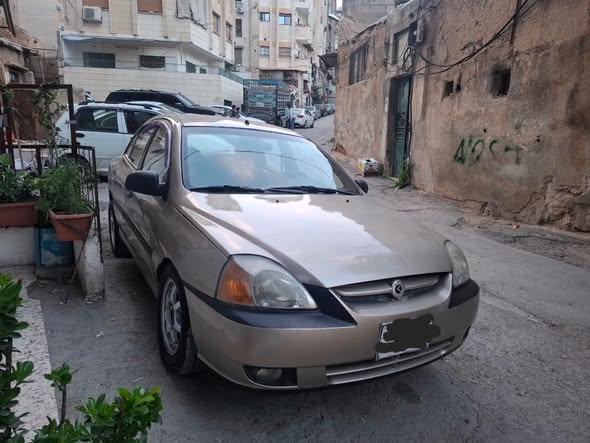 كيا ريو 2004 - صورة 1