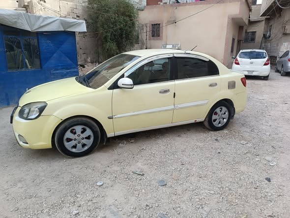 كيا ريو 2011 - صورة 1