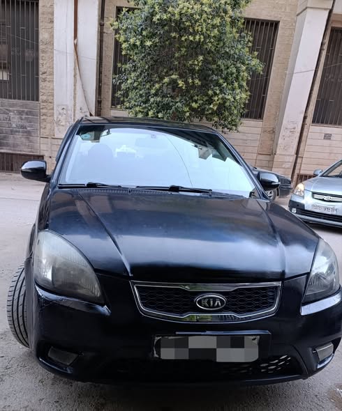 كيا ريو 2010 - صورة 1