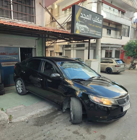 كيا فورتي 2011 - صورة 4