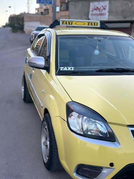 كيا ريو 2011 - صورة 1