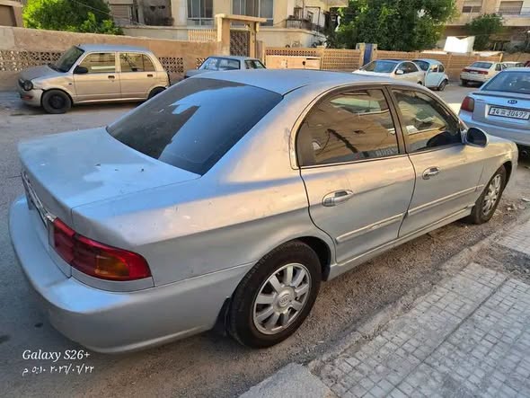 كيا أوبتيما 2001 - صورة 2