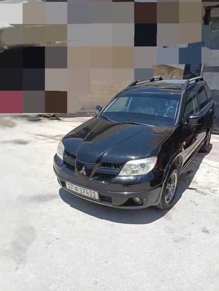 مستوبيشي اوتلاندر 2006 - صورة 1