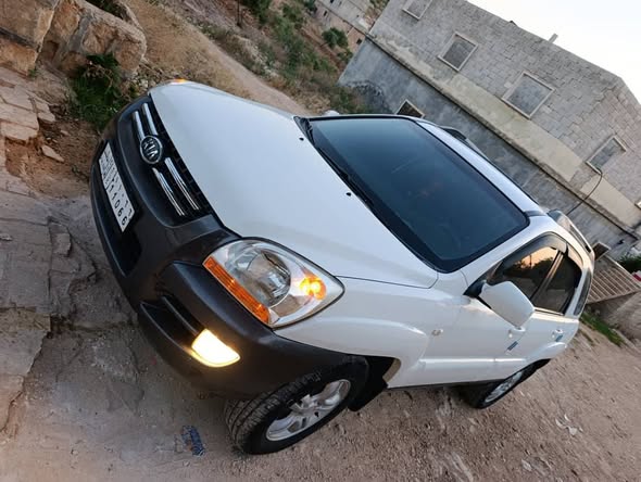 كيا سبورتاج 2004 - صورة 1