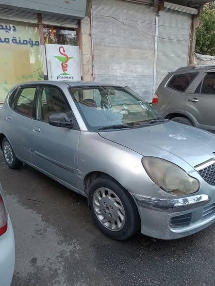 دايهاتسو سيريون 2004 - صورة 2