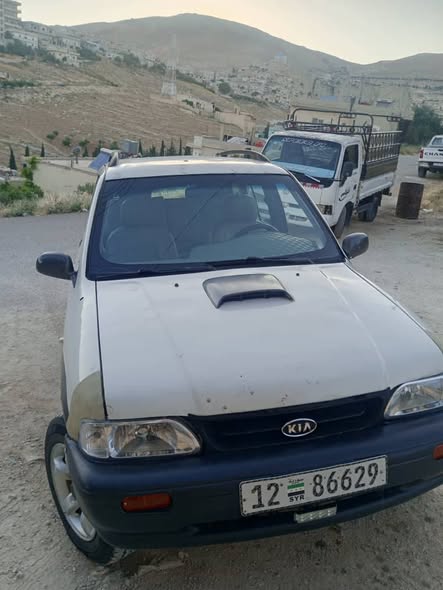 كيا سبورتاج 2001 - صورة 1