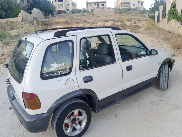 كيا سبورتاج 2001 - صورة 2