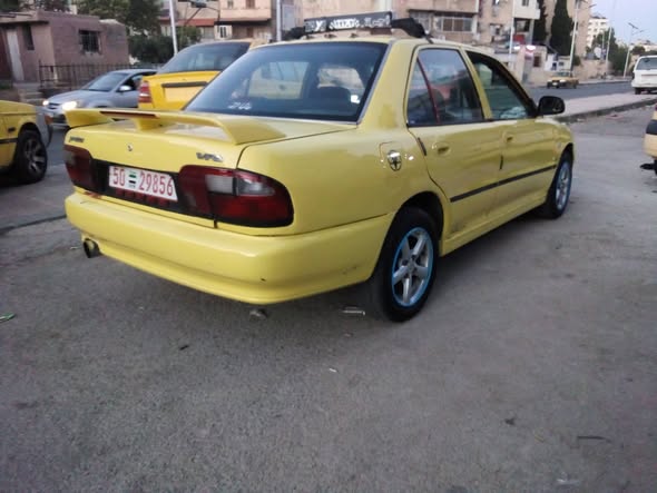بروتون ويرا 2003 - صورة 4
