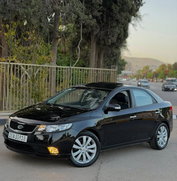 كيا فورتي 2010 - صورة 2