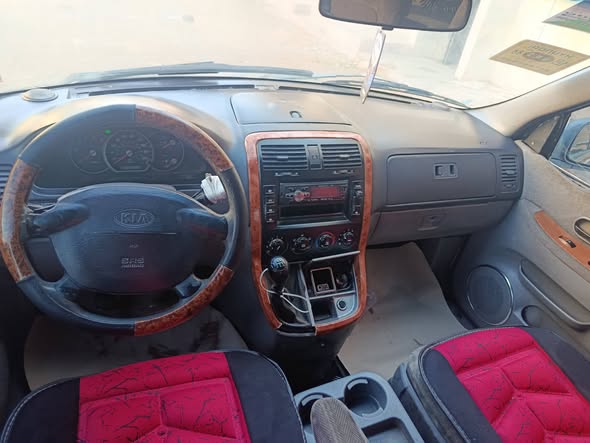 كيا كرنفال 2002 - صورة 5