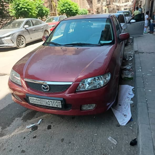 مازدا 323 2003 - صورة 1