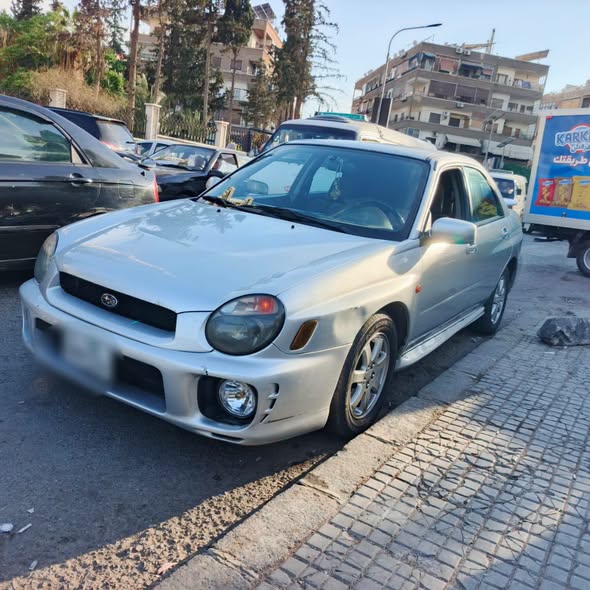 سوبارو امبريزا 2002 - صورة 1