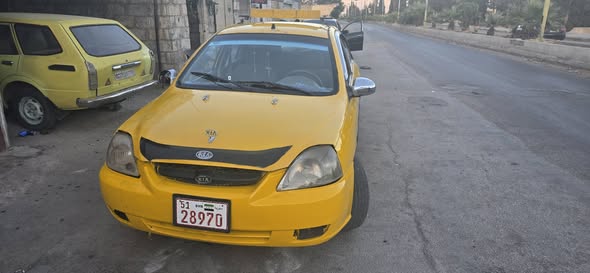 كيا ريو 2003 - صورة 5