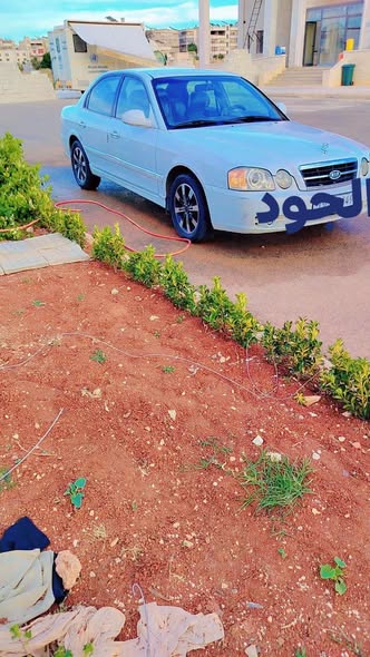 كيا اوبتيما 2004 - صورة 1