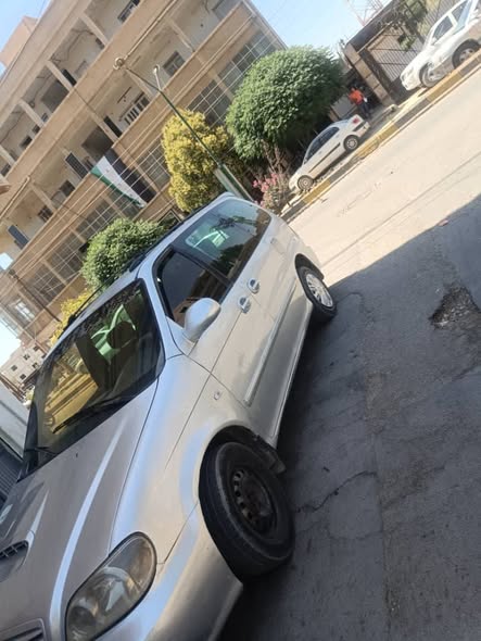كيا كرنفال 2003 - صورة 3