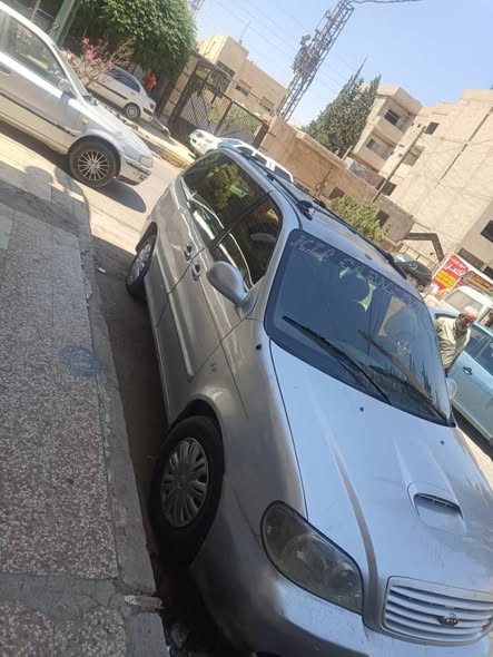 كيا كرنفال 2003 - صورة 4