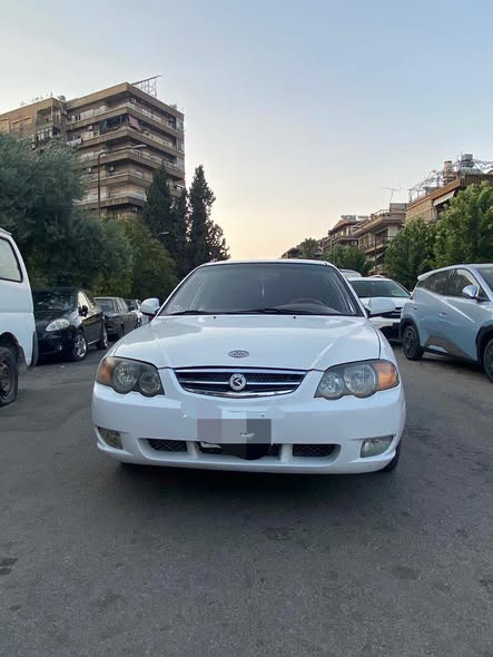 كيا شوما 2003 - صورة 1