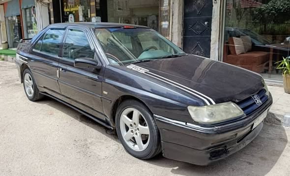 بيجو 605 1993 - صورة 1