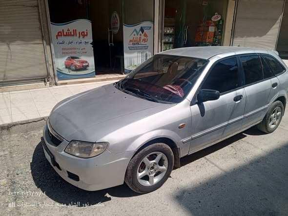 مازدا 323 2002 - صورة 1