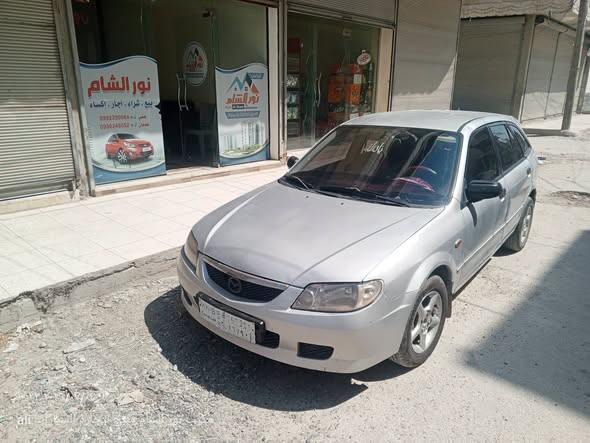 مازدا 323 2002 - صورة 2