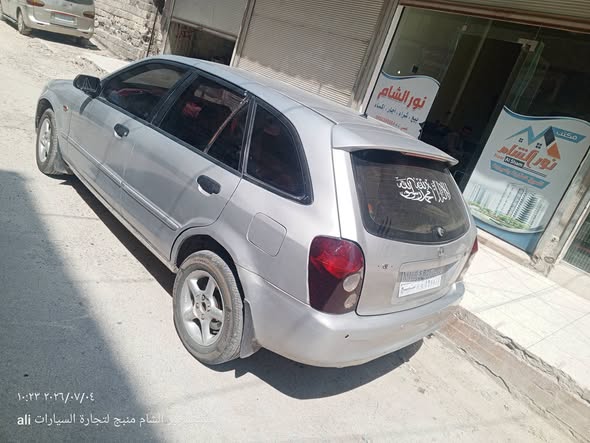 مازدا 323 2002 - صورة 3