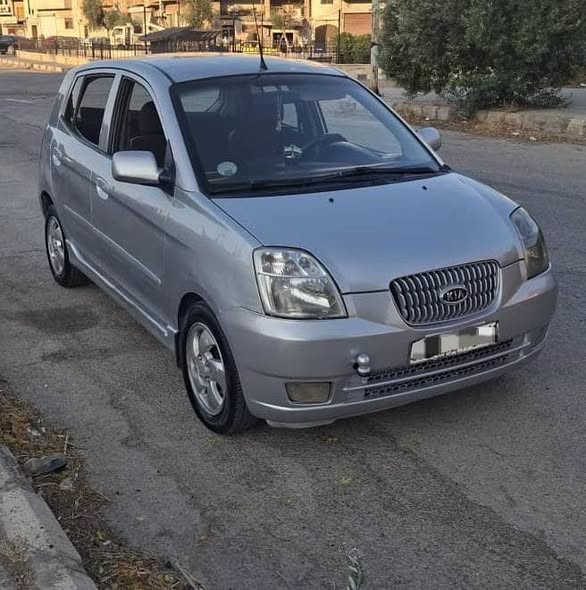 كيا مورينغ 2006 - صورة 1
