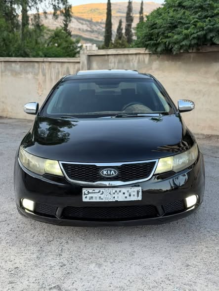 كيا فورتي 2010 - صورة 2