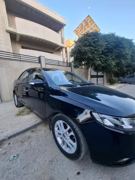 كيا فورتي 2010 - صورة 3