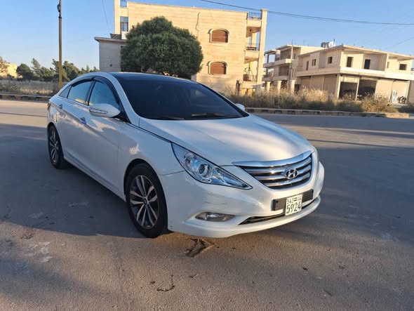 كيا كيا K3 2013 - صورة 4