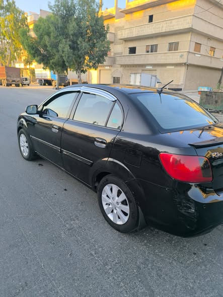 كيا ريو 2011 - صورة 1