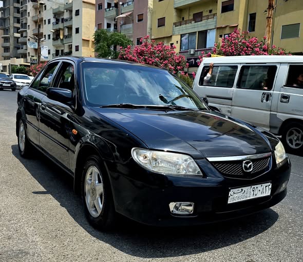 مازدا 323 2003 - صورة 1