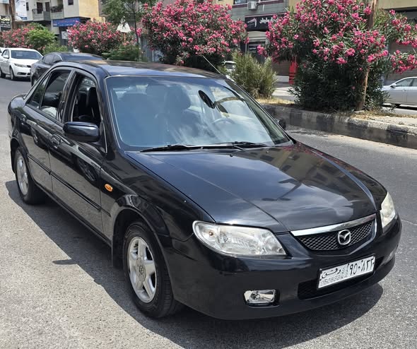 مازدا 323 2003 - صورة 3