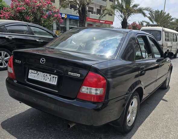 مازدا 323 2003 - صورة 5