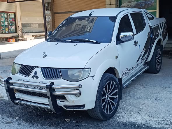 ميتسوبيشي L200 2011 - صورة 1