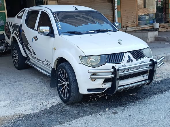 ميتسوبيشي L200 2011 - صورة 2
