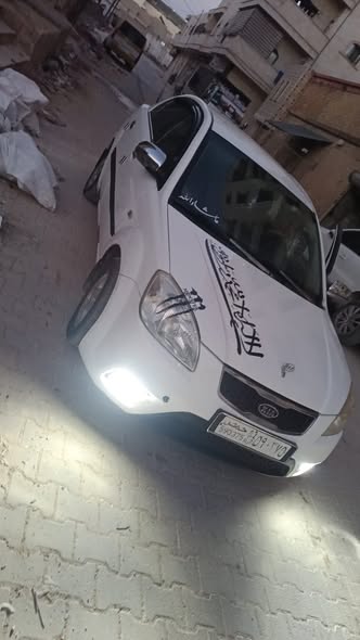 كيا ريو 2011 - صورة 1