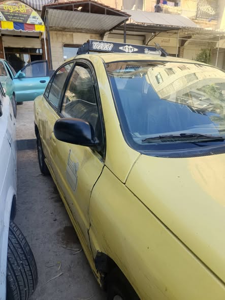 كيا ريو 2002 - صورة 2