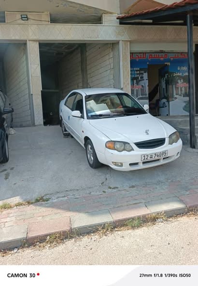 كيا شوما 2003 - صورة 1