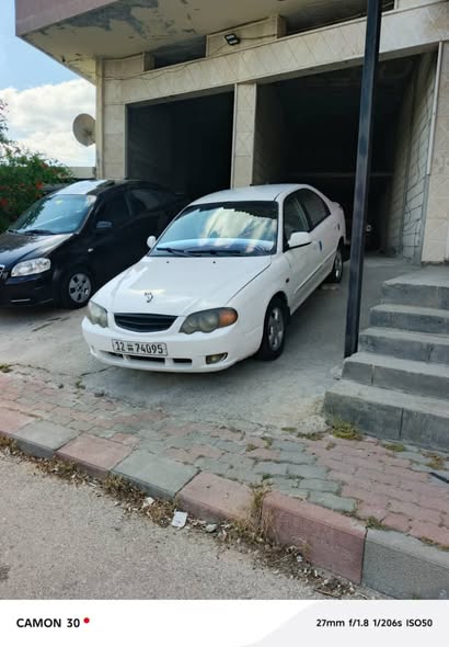 كيا شوما 2003 - صورة 3