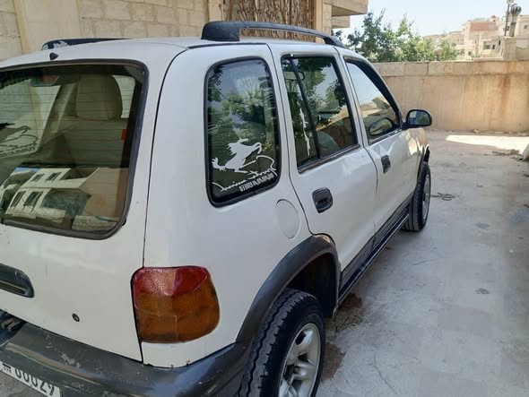 كيا سبورتاج 2001 - صورة 1