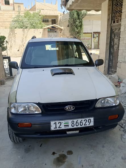 كيا سبورتاج 2001 - صورة 2