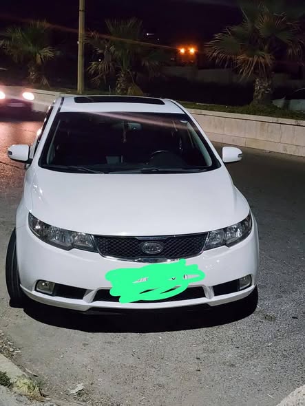 كيا فورتي 2011 - صورة 1
