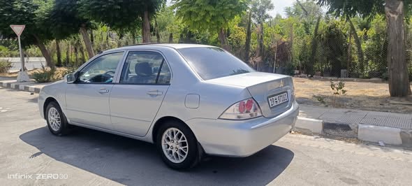 متسوبيشي لانسر 2006 - صورة 5