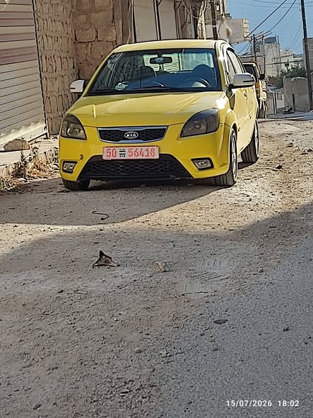 كيا ريو 2011 - صورة 1